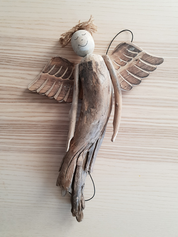 Wooden bali angels craftsmen handmade organic christmas sally bourne interiors london